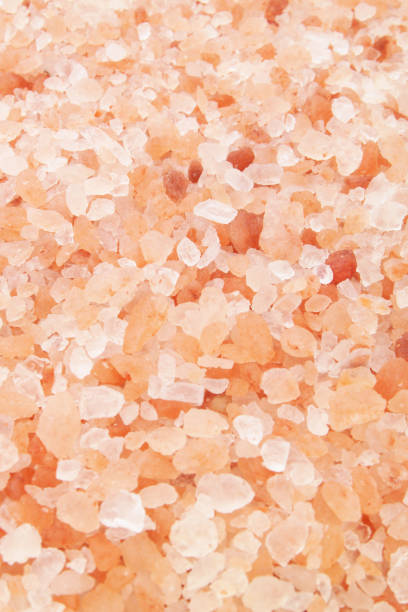 istock Pink himalayan rock salt background 1179115903
