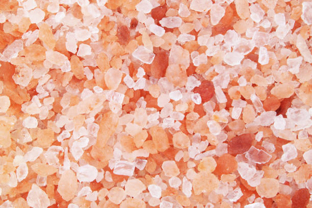 istock Pink himalayan rock salt background 1179115909