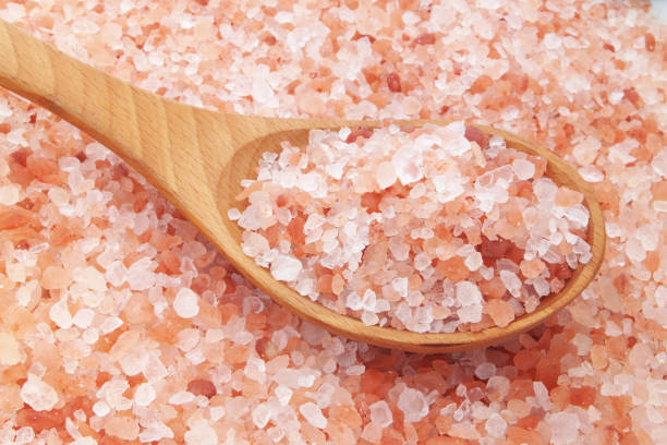 istock Pink himalayan rock salt with spoon 1179116095
