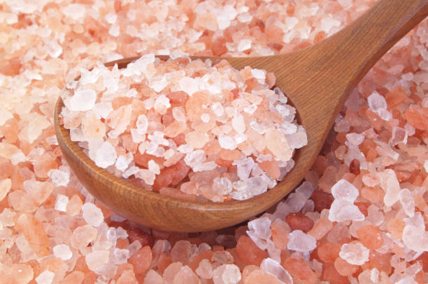 istock Pink himalayan rock salt with spoon 1179116144