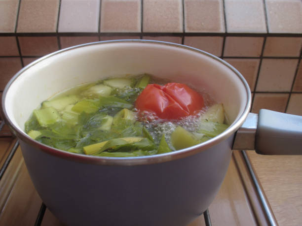istock Pan with vegetables for a soup being cooked on a baking tray 1179117167