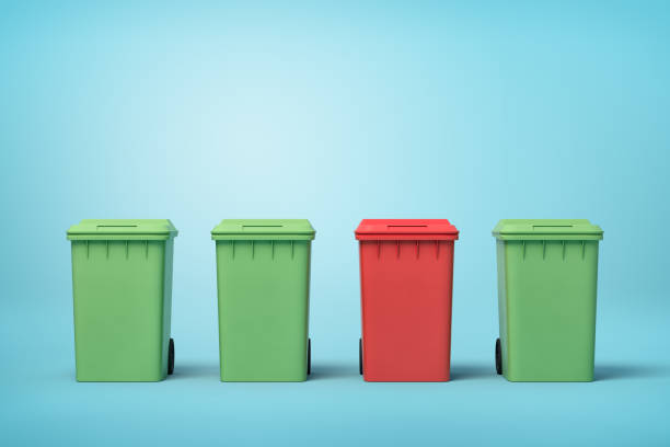 istock 3d rendering of three green and one red trash bins on blue background 1179117268