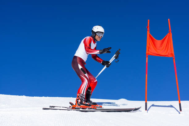 istock concentrated professional skier during race inspection clear blue sky 1179119522