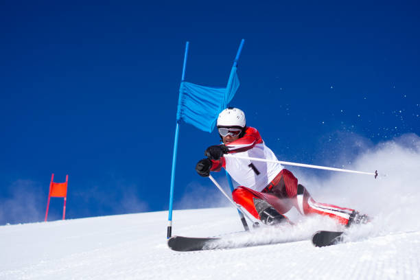 istock dynamic professional skier during super g skiing race 1179119523