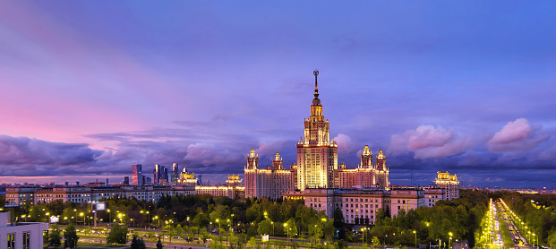 Aerial panoramic view of Moscow university campus under dramatic sunset sky in autumn