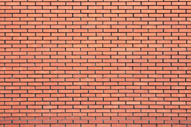 istock Beautiful brick wall of bright orange color. Texture, background 1179120772