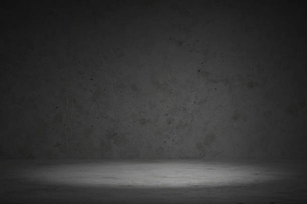 istock white concrete or cement with low light or darkness wall background, interior design. Mockup display products. 1179120844