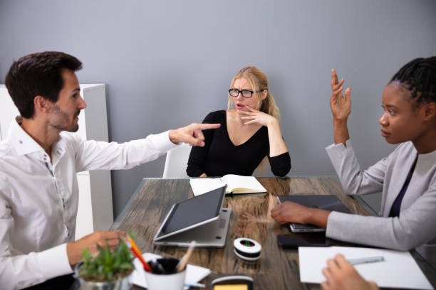istock Business Man Discussing Project Sitting At Office Desk 1179124080