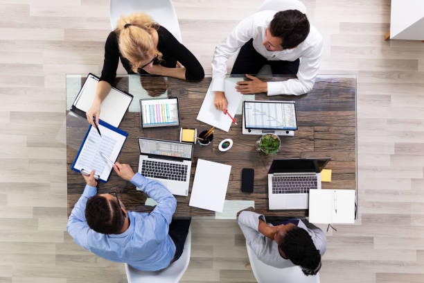 istock Young Businesspeople Discussing Data In Meeting Room 1179124088