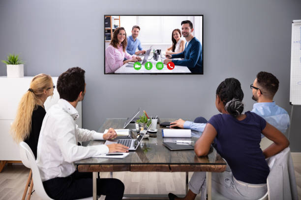 istock Businesspeople Discussing Graphs Through Videochat 1179124135