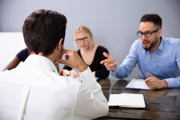 istock Business People Conducting Job Interview Looking At Applicant 1179124723