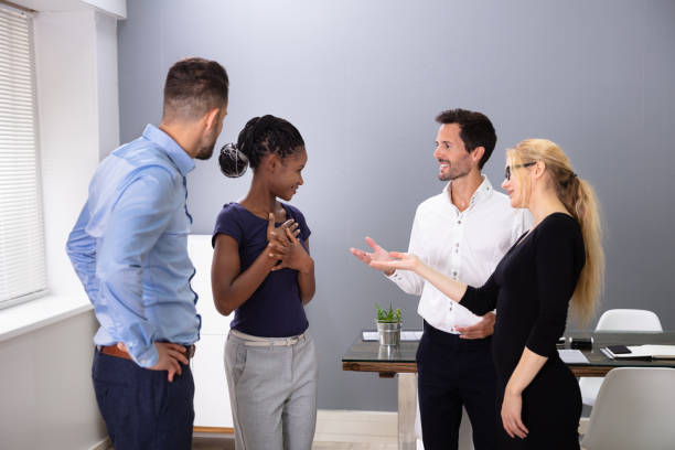 istock Male Executive Introducing New Hire Employee To His Team 1179124785