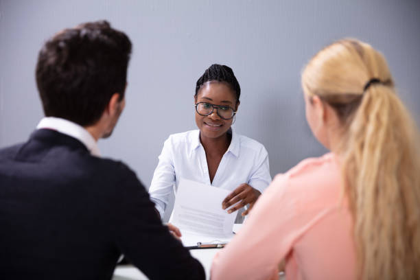 istock Couple At Interview At Adoption Agency 1179125349