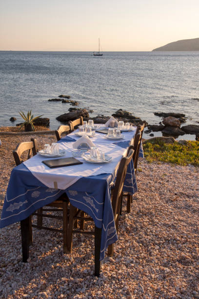 istock sunset beach restaurant at Anavyssos 1179126294