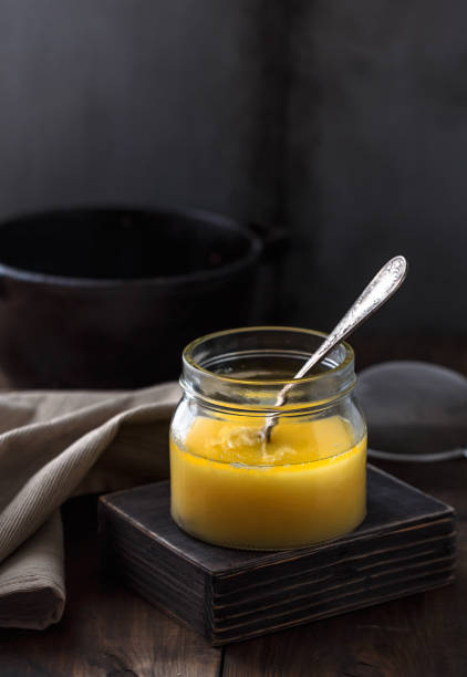A jar of ghee or clarified butter, copy space stock photo