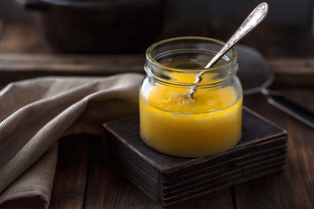 istock Ghee or clarified butter in a jar. 1179130909