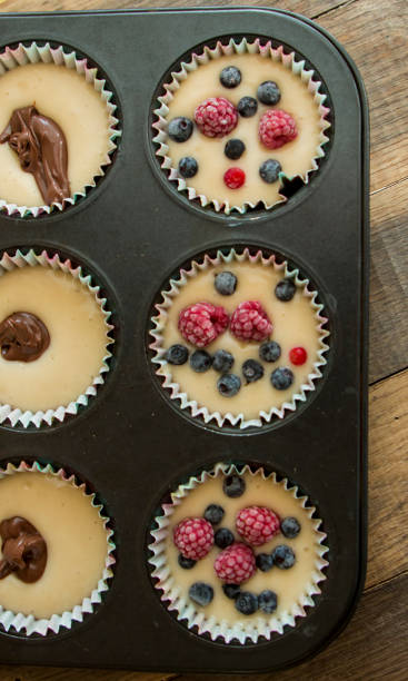 istock Delicious home made muffins with wild berries powdered with icing sugar 1179134301
