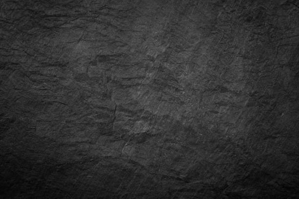 istock Dark grey and black slate background or texture 1179136278
