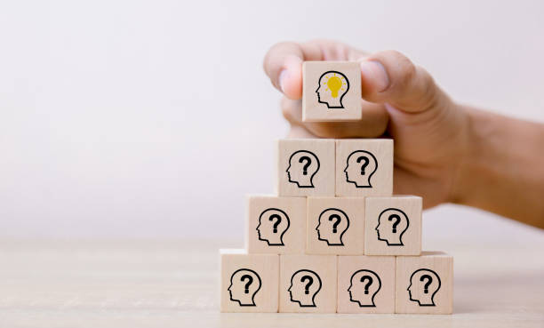 istock Hand arranging wood block with icon head human symbol and light bulb,concept creative idea and innovation. 1179139521