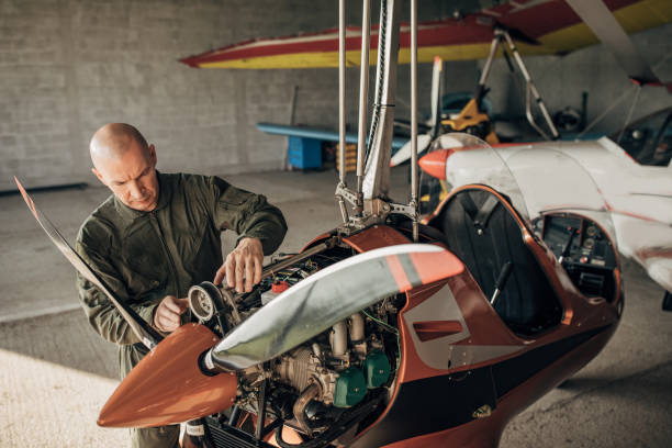 istock Airplane mechanic repairing airplane 1179139834