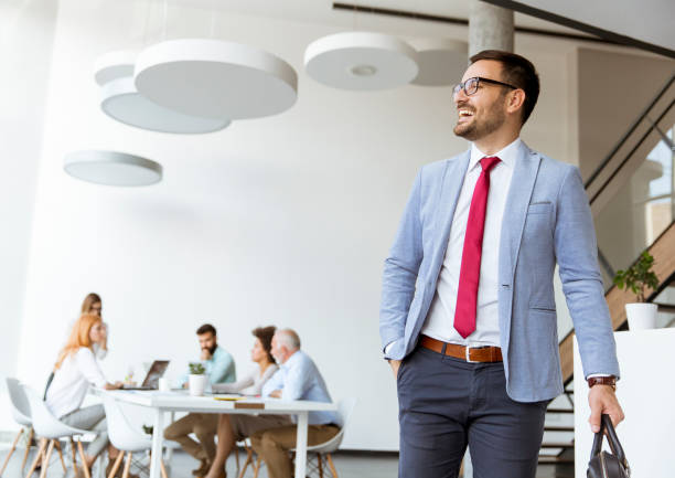 istock Handsome businessman leaving office 1179140034