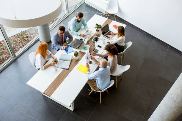 istock Top view at business people in office 1179140039