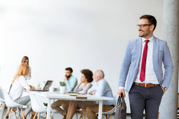 istock Handsome businessman leaving office 1179140041