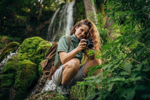 istock Female Biologist Photographing  Plants 1179141548