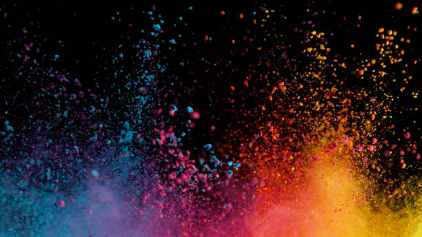 istock Explosion of colored powder on black background 1179145454