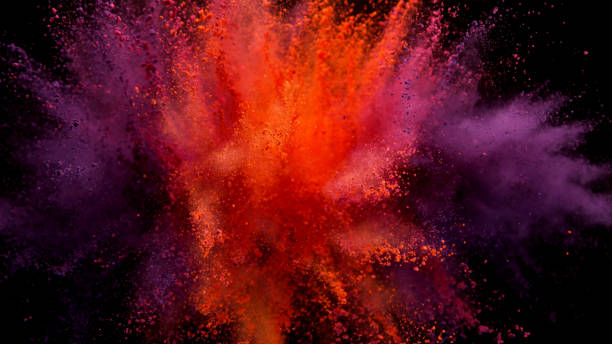 istock Explosion of colored powder on black background 1179145484