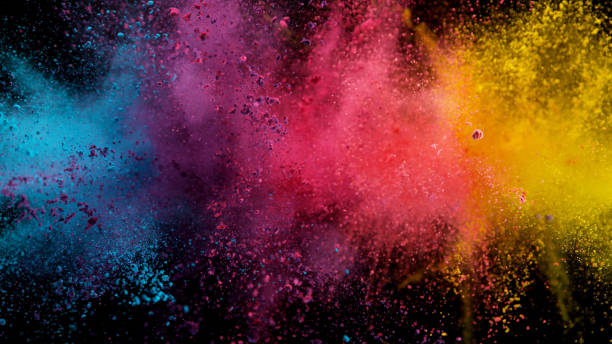 istock Explosion of colored powder on black background 1179145514
