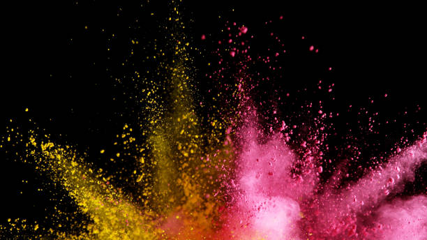 istock Explosion of colored powder on black background 1179145522