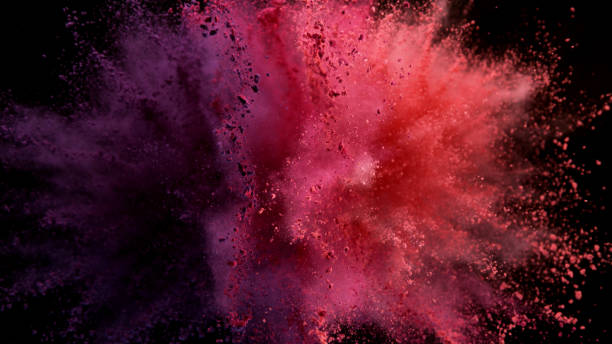 istock Explosion of colored powder on black background 1179145558