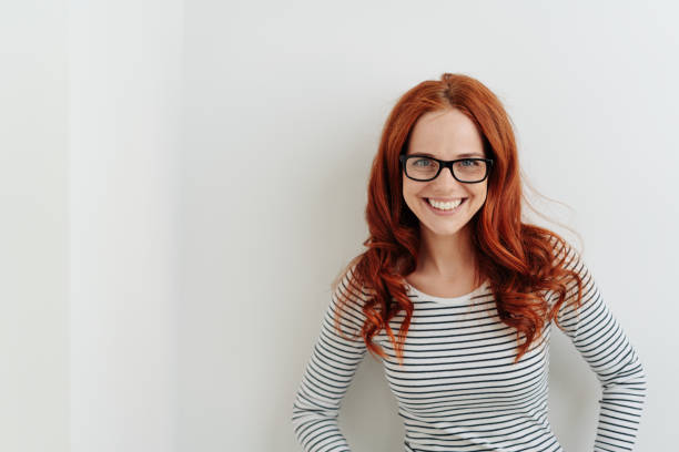 istock Happy joyful young woman grinning at the camera 1179149073