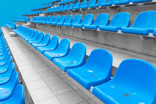 istock Low angle view of empty spectator seats at sport facility for international competitions 1179150630