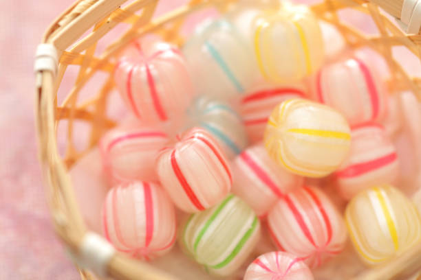 Strawberries, dumplings, jelly and beans on a pink background