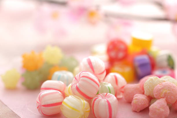 closeup of colorful traditional candies on white background