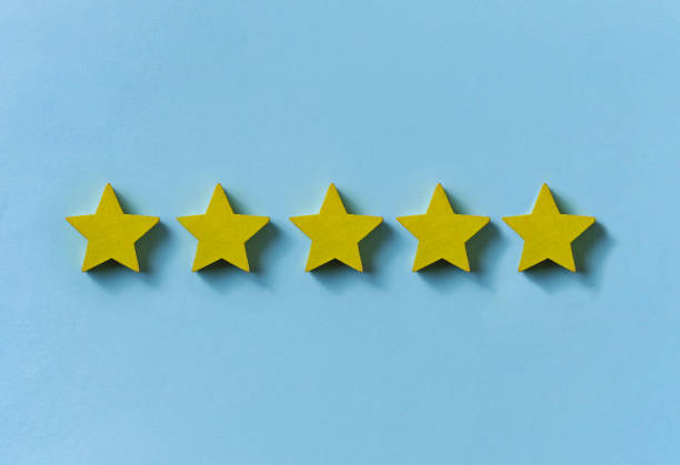 istock Line of five gold stars on blue 1179152621