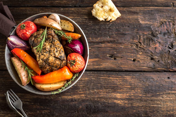 istock Roasted meat and vegetables 1179156195