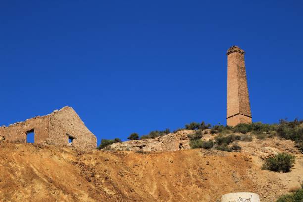 istock Sediments, rock formations and mineral streaks in an old abandoned quarry 1179159270