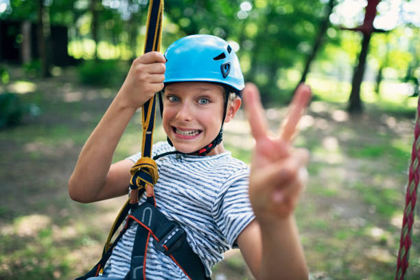 Little boy on zip line posing to a portrait Little boy practicing in ropes course in adventure park. The boy is ziplining on sunny summer day.
Nikon D850 canopy tour photos stock pictures, royalty-free photos & images