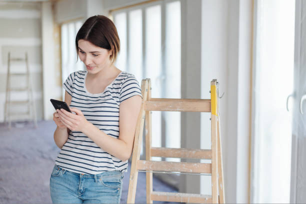 istock Young woman texting a message on a mobile 1179159661