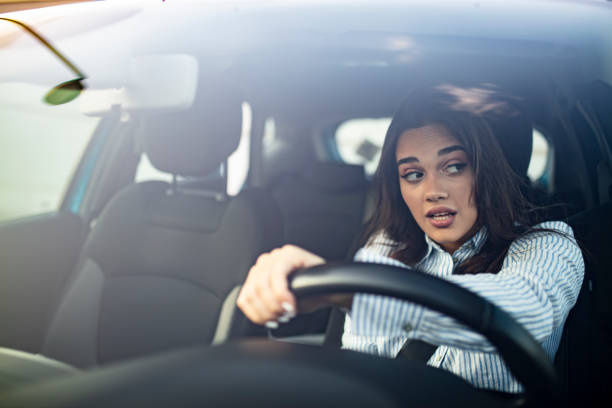 istock Woman driving a car. 1179160102