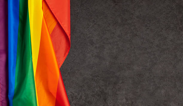 istock LGBT Pride Rainbow Flag. Black background 1179161307