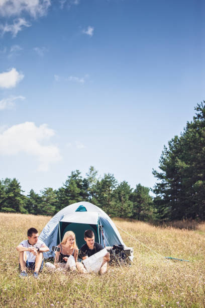 istock Teenagers camping in nature 1179161374