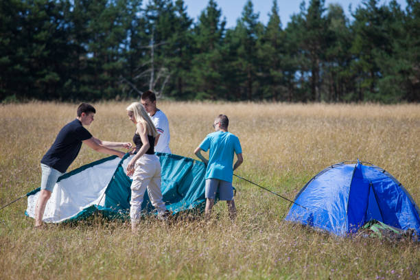 istock Teenagers camping in nature 1179161431