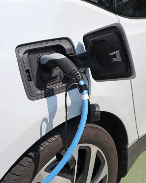 istock Car at the electric charging station 1179162579