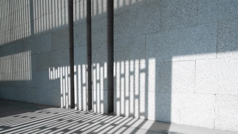 modern building with moving shadow,time lapse