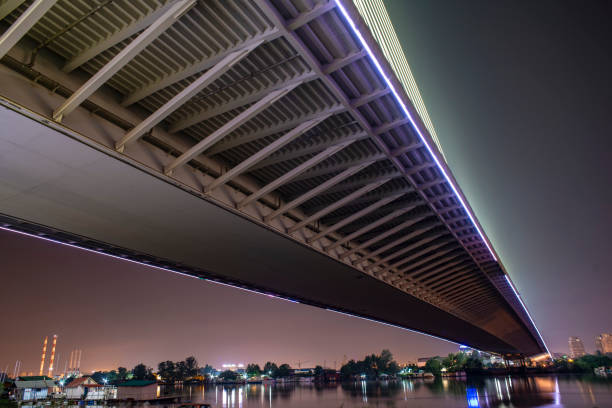 istock Ada bridge with it's structure beams taken from under it at night 1179164419