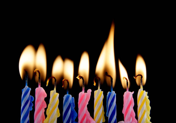 istock Birthday candles on black 1179167859